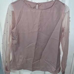 Blush pink top with sheer sleeves and pearl detail